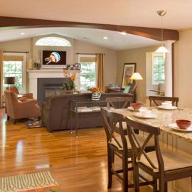 interior of blackdog design/build/remodel kitchen to open concept living room with exposed beam