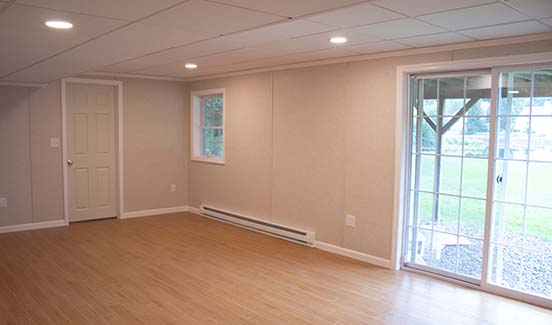 Living room with wooden floors and sliding glass doors