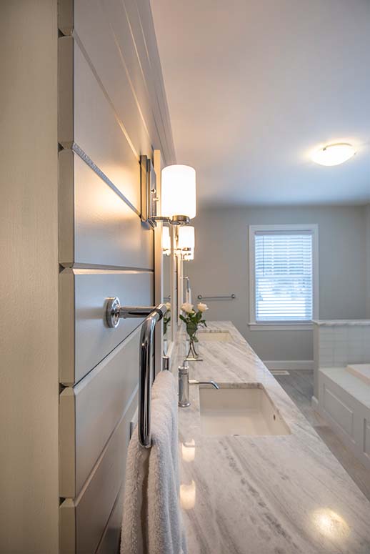 Bathroom with black granite countertop and toilet