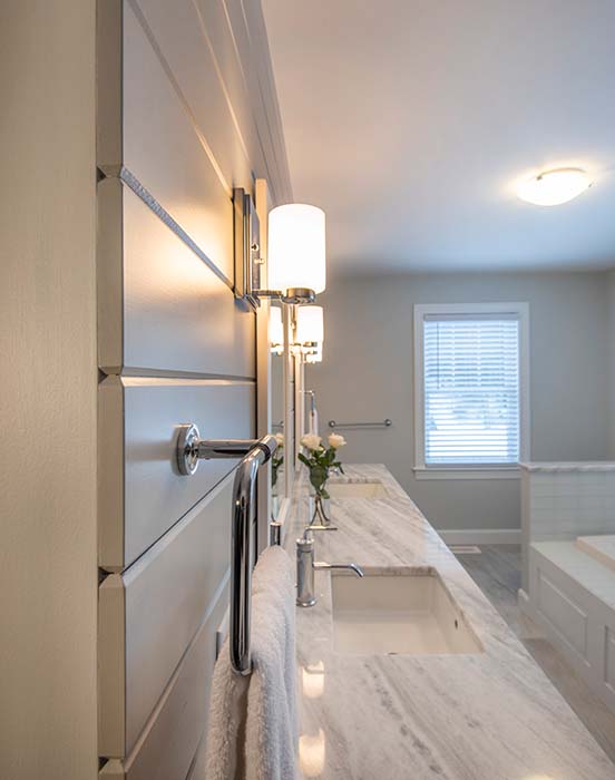 Bathroom with black granite countertop and toilet