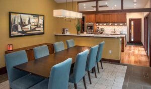 Modern dining room with dining table, chairs and lighting