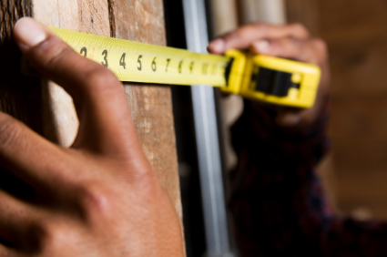 Tape measure up against wood